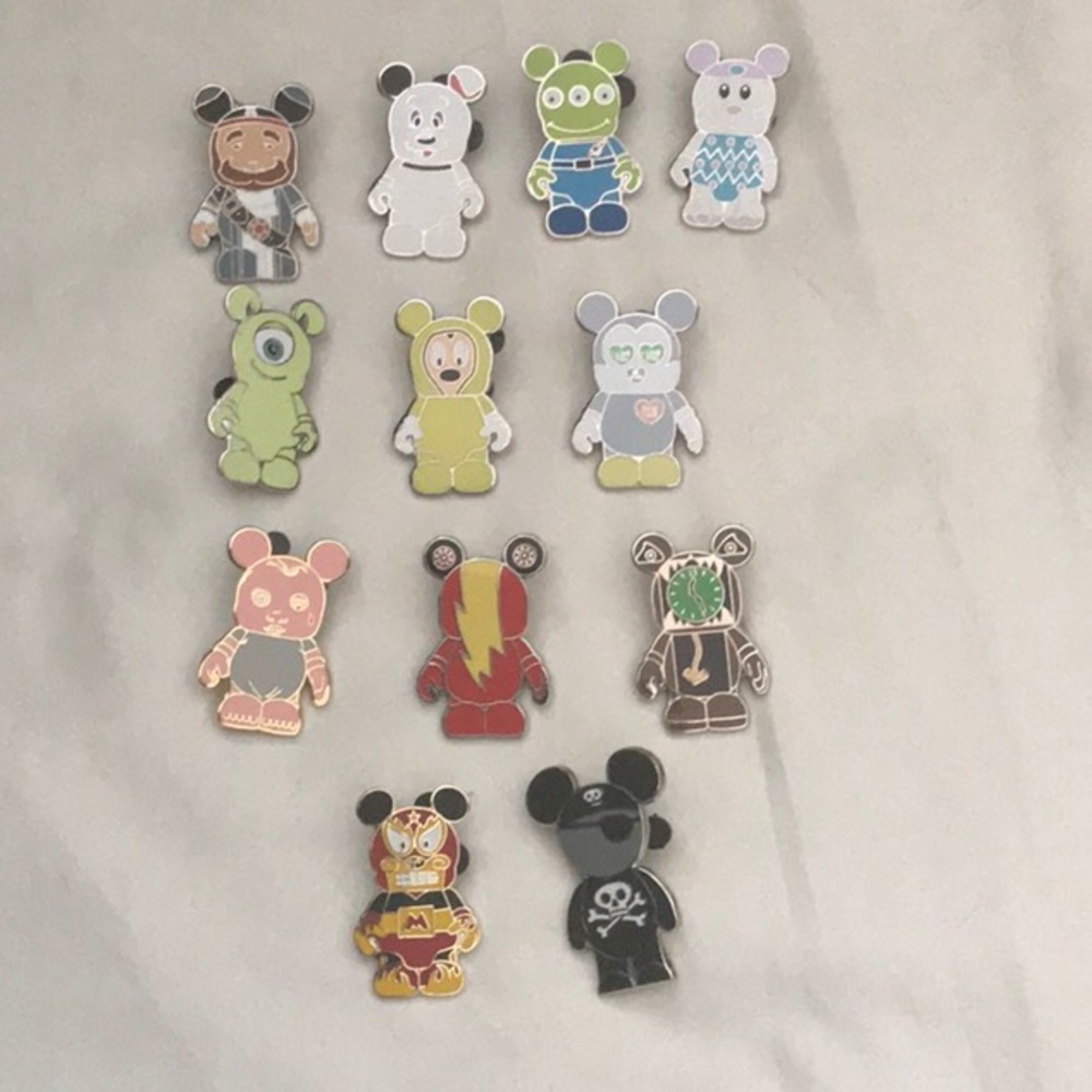 Sold. Disney Vinylemation 11 pin set